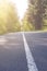 Country asphalt road with tree