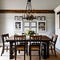 Country Charm: A cozy farmhouse-style dining room with a rustic wooden table, mason jar chandeliers, and a gallery wall of vinta