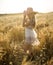 Country girl in hay field 2