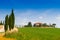 Country house with cypress in Tuscany, Italy