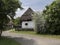 Country house from Eastern Europe with straw roof