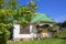 Country house on a green lawn.