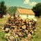 Country house with pile of firewood
