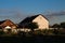 Country house at sunset. Large housing for people