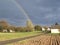 Country landscape with double rainbow