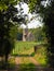 Country lane and petty church of St Deny`s Church, Little Barford, Bedfordshire