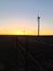 Country Mile at Sunset with Wind Turbines