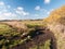 Country mud path grass land farm village Wivenhoe distance