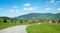 Country road above lake tegernsee and spa town bad wiessee with beautiful view