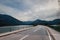 Country road along Faller Klamm Bridge across Lake Sylvenstein