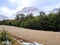 Country road in Andes snowy mountain range landscape. Forest track. Glaciers and Mountaineering. Landscape and extreme nature