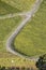 Country road bends on vineyards slope near Rotenberg, Germany