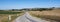 country road in lorraine landscape under blue sky in summer