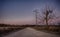 Country road with waning moon