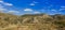 Country side rocky landscape environment of Arizona United States wilderness view with curved lonely car road between hills