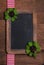 Country style background with an old blackboard, shamrock and re