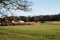 Country view on a field and stored boat in Sweden