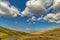 Countryside Cloudscape Over Sunny Hills.