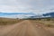 Countryside dirt road landscape. Rural travel with unsealed road background