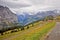 Countryside house, farm, mountain, green field, footpath in Switzerland