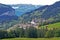 Countryside house, farm, mountain, green field, footpath in Switzerland