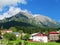 Countryside houses near rocky mountain