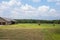 Countryside landscape with a stable in the field