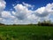 Countryside landscape with white clouds