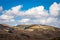 Countryside mountainous landscape with bright blue sky at morning from flat angle