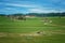 Countryside, Mountains, Green Grass Field and house in Switzerland