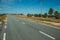 Countryside paved road and electric poles