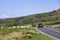 Countryside road with view,car driving past rural Wales,Uk.