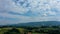 Countryside rural clouds Timelapse. Tropical scenery. Motion at blue sky.