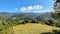 Countryside scenery in mountains. beautiful landscape of carpathians with meadows rolling through forested hills in the day light