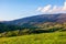 countryside scenery in mountains at sunset.