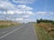 Countryside sloping road, with construction works on sides