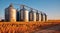 Countryside Storage Solutions Silos Amidst Wheat Crop