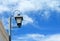 Countryside Streetlamp against Vibrant Blue Sunny Sky