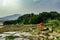 Countryside tarnish framing rice field with small resting hut at morning