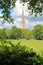 The countryside with the tower and spire of the Cathedral of Norwich in the background, Norfolk, UK