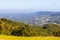 Countryside view with forest, mountains and small farms