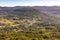 Countryside view with forest, mountains and small farms