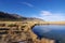 County Line Pond and desert grasses with mountains in the background at Ruby Lake National Wildlife Refuge outside of Elko, Nevada