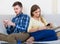 Couple addicted to social networking with cell phones