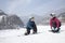 Couple adjusting Ski Boots in Ski Resort