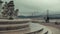 Couple admires the bridge on April 25 and the statue of Christ the Savior from the observation deck. Old fountain with fancy fish