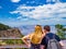 Couple admires Panorama of Grand Canyon National Park Mather Point Arizona USA