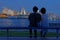 A couple admires the skyline view of Yokohama