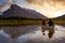 Couple adventurous friends are canoeing in a lake