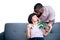 Couple, African American husband gives roses flower and kissing his wife with love